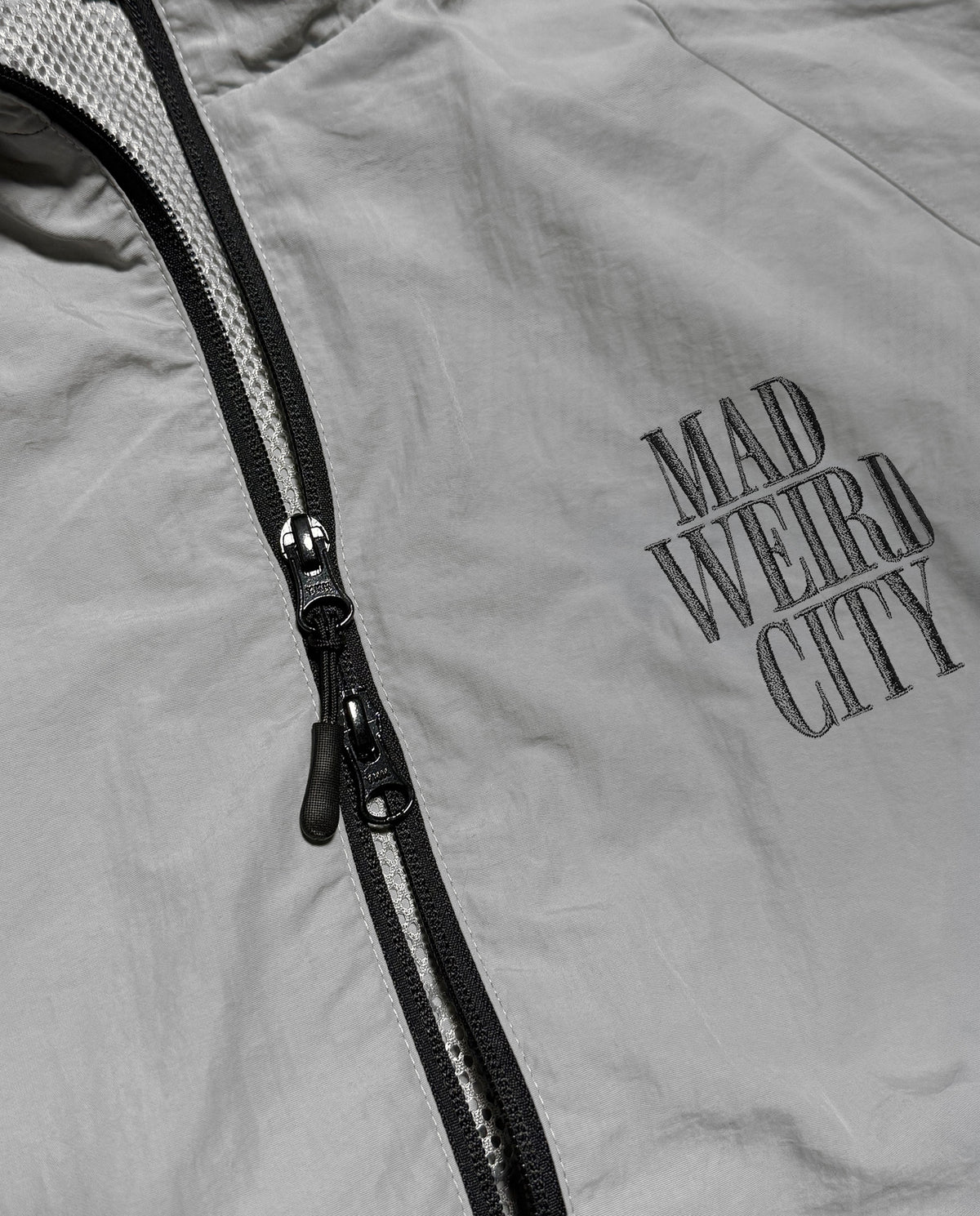 MAD WEIRD CITY Nylon Jacket [Gray × Dark Gray]