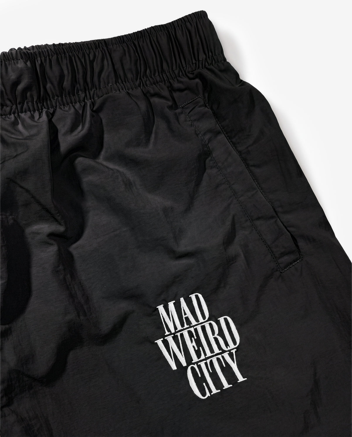 MAD WEIRD CITY Nylon Pants [Black × White]