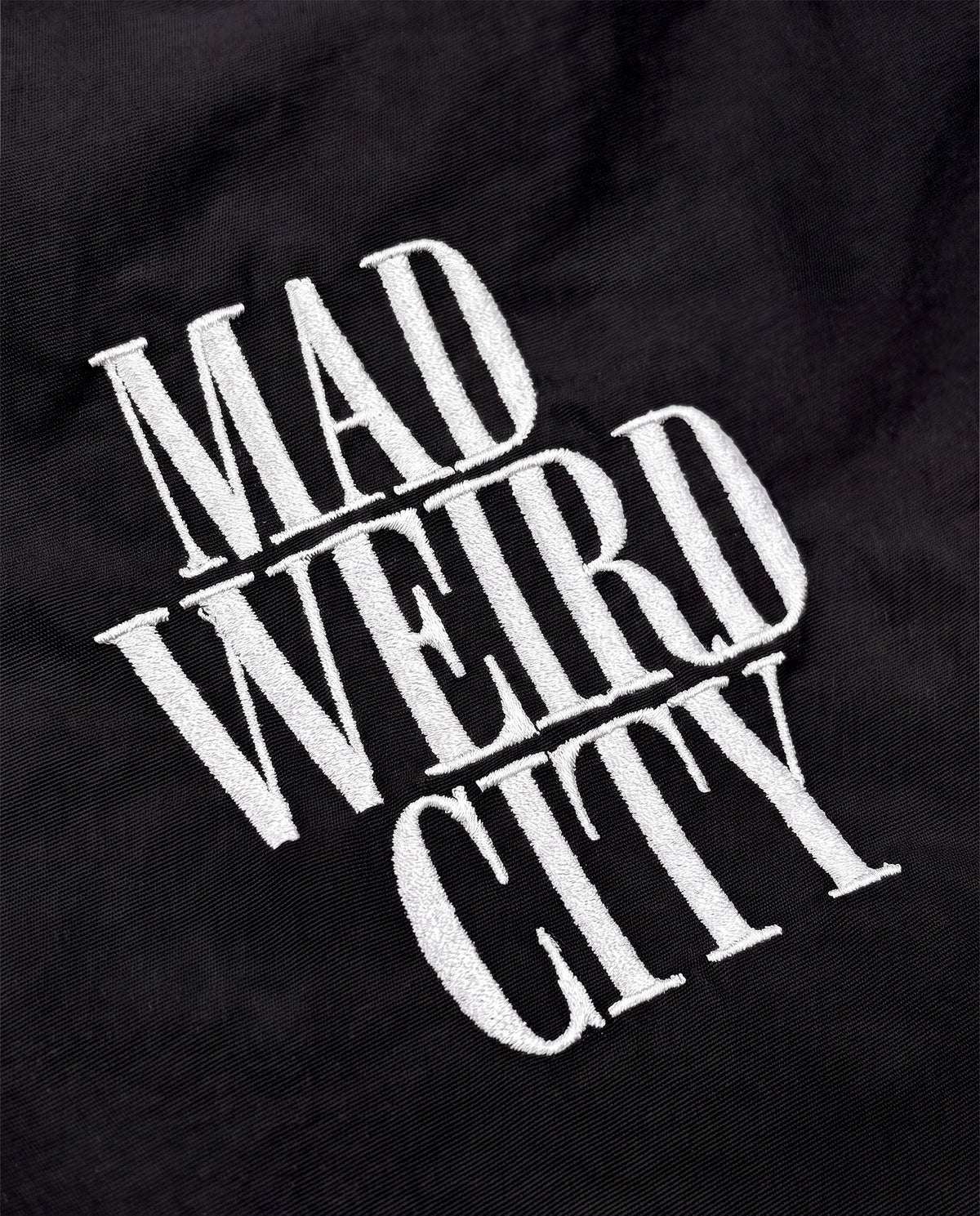 MAD WEIRD CITY Nylon Pants [Black × White]
